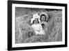 A Young Brother and Sister Nestled in the Hay, Ca. 1900-null-Framed Photographic Print