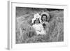 A Young Brother and Sister Nestled in the Hay, Ca. 1900-null-Framed Photographic Print