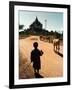 A Young Burmese Boy Tends His Family's Cows Near the Thatbinnyu Temple-null-Framed Photographic Print