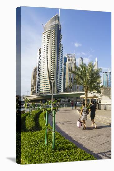 A Young Couple at Dubai Marina, Dubai, United Arab Emirates, Middle East-Fraser Hall-Stretched Canvas