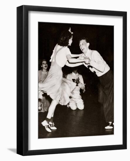 A Young Couple Dancing 'The Big Apple'-null-Framed Photographic Print