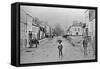 A Young Delivery Boy Stands Nonchalantly in the Main Street of Clonmorris-Thomas Wynne-Framed Stretched Canvas