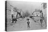 A Young Delivery Boy Stands Nonchalantly in the Main Street of Clonmorris-Thomas Wynne-Stretched Canvas