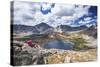 A Young Female Hiker Enjoys a Rest During a Day Hike Up Pyramid Peak, at Pyramid Lake, Wyoming-Ben Herndon-Stretched Canvas