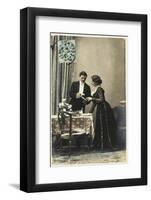 A Young French Couple Give their First Dinner Party-null-Framed Photographic Print