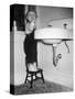 A Young Girl Brushes Her Teeth at the Sink, Ca. 1955-null-Stretched Canvas