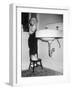 A Young Girl Brushes Her Teeth at the Sink, Ca. 1955-null-Framed Photographic Print