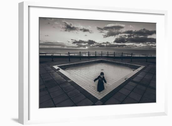 A Young Girl in an Empty Desolate Paddling Pool-Clive Nolan-Framed Photographic Print