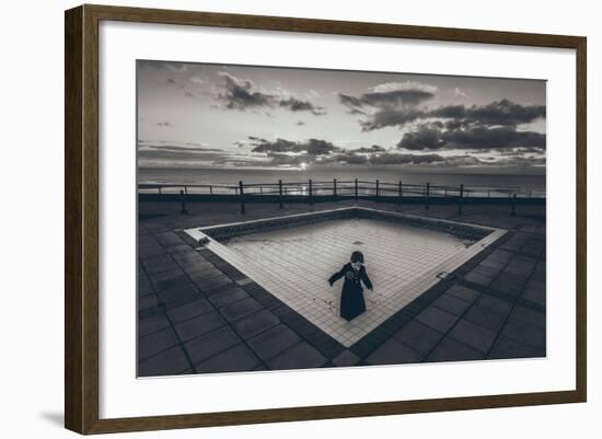 A Young Girl in an Empty Desolate Paddling Pool-Clive Nolan-Framed Photographic Print