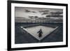 A Young Girl in an Empty Desolate Paddling Pool-Clive Nolan-Framed Photographic Print