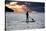 A Young Girl on a Stand Up Paddle Board on Baleia Beach at Sunset-Alex Saberi-Stretched Canvas