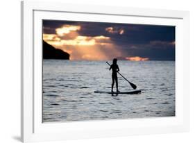 A Young Girl on a Stand Up Paddle Board on Baleia Beach at Sunset-Alex Saberi-Framed Photographic Print