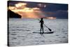 A Young Girl on a Stand Up Paddle Board on Baleia Beach at Sunset-Alex Saberi-Stretched Canvas