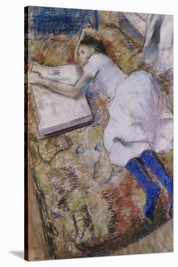 A Young Girl Stretched Out and Looking at an Album-Edgar Degas-Stretched Canvas