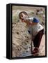 A Young Internally-Displaced Child at a Camp for Displaced Iraqis Who Have Fled Violence-null-Framed Stretched Canvas