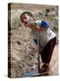 A Young Internally-Displaced Child at a Camp for Displaced Iraqis Who Have Fled Violence-null-Stretched Canvas