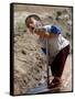 A Young Internally-Displaced Child at a Camp for Displaced Iraqis Who Have Fled Violence-null-Framed Stretched Canvas