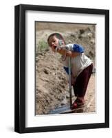 A Young Internally-Displaced Child at a Camp for Displaced Iraqis Who Have Fled Violence-null-Framed Photographic Print