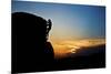 A Young Male Climber Climbs a Boulder Problem at Sunset in Hampi, India-Dan Holz-Mounted Photographic Print