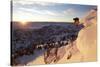 A Young Male Skier Jumps of the Side of a Mountain at Alta, Uthah-Adam Barker-Stretched Canvas