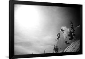 A Young Male Skier Jumps Off the Side of a Mountain at Alta, Utah-Adam Barker-Framed Photographic Print