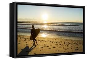 A Young Male Surfer Walks Along the Beach at End of Long Beach Island, New Jersey-Vince M. Camiolo-Framed Stretched Canvas