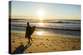 A Young Male Surfer Walks Along the Beach at End of Long Beach Island, New Jersey-Vince M. Camiolo-Stretched Canvas