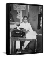 A Young Man Sitting at a Typewriter, Indonesia, 20th Century-null-Framed Stretched Canvas