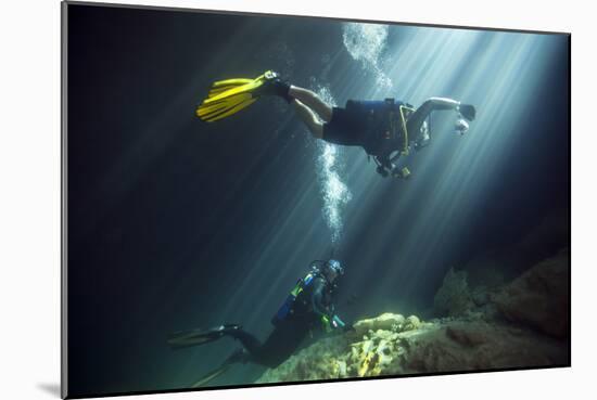 A Young Married Couple Scuba Diving in Devil's Den Springs Florida-null-Mounted Art Print