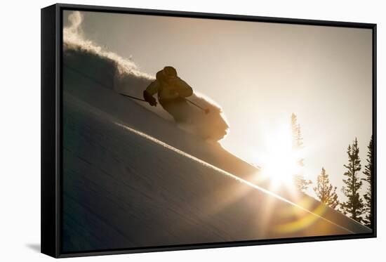 A Young Skier Chases the Sun Down the Ski Slope in the Wasatch Backcountry, Utah-Louis Arevalo-Framed Stretched Canvas