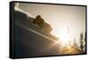 A Young Skier Chases the Sun Down the Ski Slope in the Wasatch Backcountry, Utah-Louis Arevalo-Framed Stretched Canvas