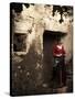 A Young Spanish Woman Wearing Traditional Flamenco Dress Standing in a Doorway to an Old Building-Steven Boone-Stretched Canvas