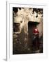A Young Spanish Woman Wearing Traditional Flamenco Dress Standing in a Doorway to an Old Building-Steven Boone-Framed Photographic Print