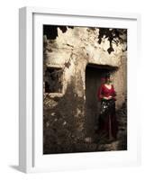 A Young Spanish Woman Wearing Traditional Flamenco Dress Standing in a Doorway to an Old Building-Steven Boone-Framed Photographic Print