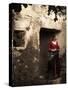 A Young Spanish Woman Wearing Traditional Flamenco Dress Standing in a Doorway to an Old Building-Steven Boone-Stretched Canvas