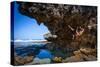 A Young Woman Climbs on a Low-Tide Boulder in Siung Beach Just Outside Yogyakarta, Indonesia-Dan Holz-Stretched Canvas