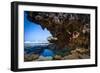 A Young Woman Climbs on a Low-Tide Boulder in Siung Beach Just Outside Yogyakarta, Indonesia-Dan Holz-Framed Photographic Print