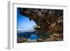 A Young Woman Climbs on a Low-Tide Boulder in Siung Beach Just Outside Yogyakarta, Indonesia-Dan Holz-Framed Photographic Print