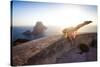 A Young Woman Does an Acrobatic Yoga Pose at the Torre Des Savinar Lookout Tower in Sw Ibiza-Day's Edge Productions-Stretched Canvas