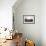 A Young Woman Does an Acrobatic Yoga Pose at the Torre Des Savinar Lookout Tower in Sw Ibiza-Day's Edge Productions-Framed Photographic Print displayed on a wall