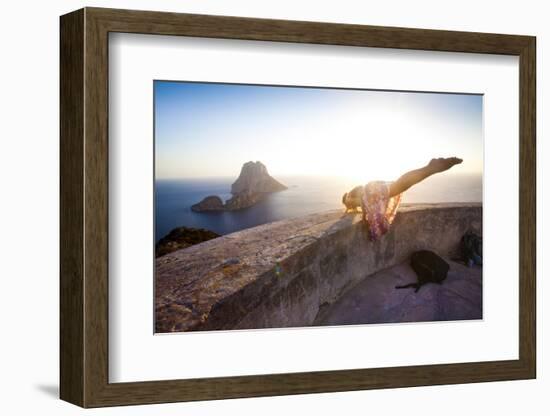 A Young Woman Does an Acrobatic Yoga Pose at the Torre Des Savinar Lookout Tower in Sw Ibiza-Day's Edge Productions-Framed Photographic Print