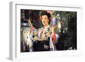 A Young Woman Holds Japanese Goods-James Tissot-Framed Art Print