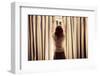 A Young Woman is Opening the Curtains at Sunrise-lolostock-Framed Photographic Print