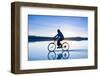 A Young Woman Rides Her Mountain Bike on the Flooded Salt Pan of the Salar De Uyuni in Sw Bolivia-Sergio Ballivian-Framed Photographic Print