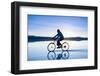 A Young Woman Rides Her Mountain Bike on the Flooded Salt Pan of the Salar De Uyuni in Sw Bolivia-Sergio Ballivian-Framed Photographic Print