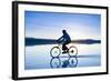 A Young Woman Rides Her Mountain Bike on the Flooded Salt Pan of the Salar De Uyuni in Sw Bolivia-Sergio Ballivian-Framed Photographic Print