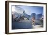 A Young Woman Runs at the Walt Disney Concert Hall in Downtown Los Angeles, California-Carlo Acenas-Framed Photographic Print