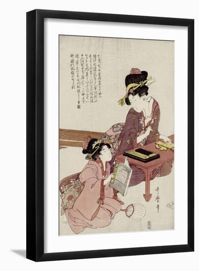 A Young Woman Seated at a Desk Writing, a Girl with a Book Looks On-Kitagawa Utamaro-Framed Giclee Print