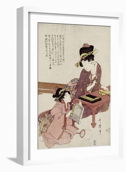 A Young Woman Seated at a Desk Writing, a Girl with a Book Looks On-Kitagawa Utamaro-Framed Giclee Print