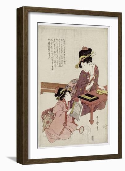 A Young Woman Seated at a Desk, Writing, a Girl with a Book Looks On-Kitagawa Utamaro-Framed Giclee Print